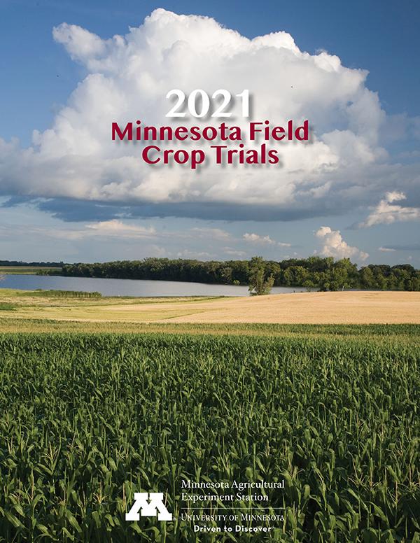 Fields of corn and wheat with a lake in the background. Text overlay states "2021 Minnesota Field Crop Trials"